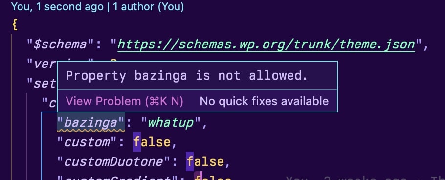 Screenshot of VSCode showing a portion of a JSON file. There is an autocompletion tooltip showing while the invalid bazinga key is selected/focussed.